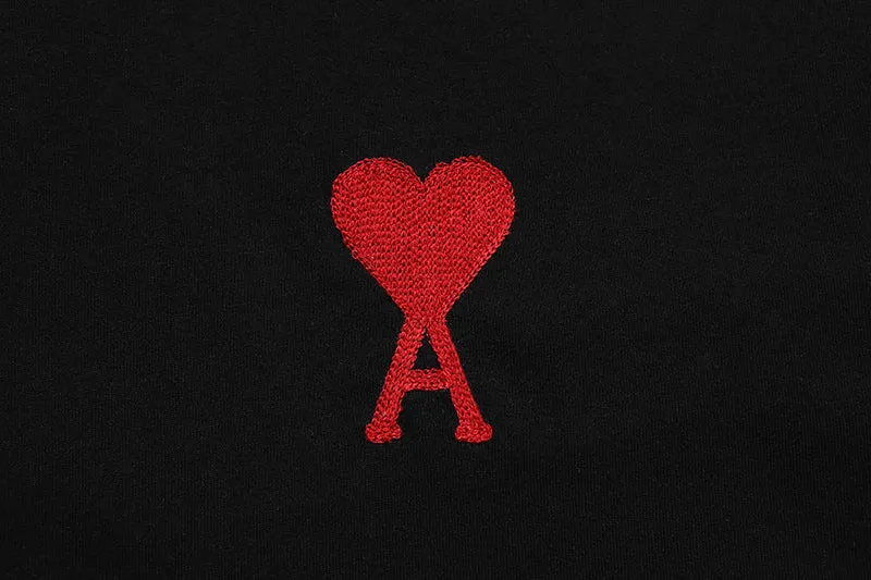 AMI PARIS - BLACK TEE WITH BIG RED HEART LOGO EMBROIDERED