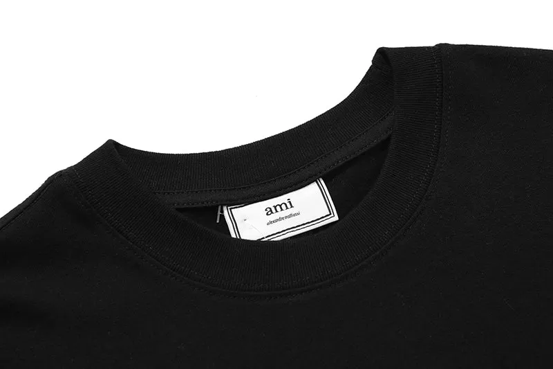 AMI PARIS - BLACK TEE WITH BIG RED HEART LOGO EMBROIDERED