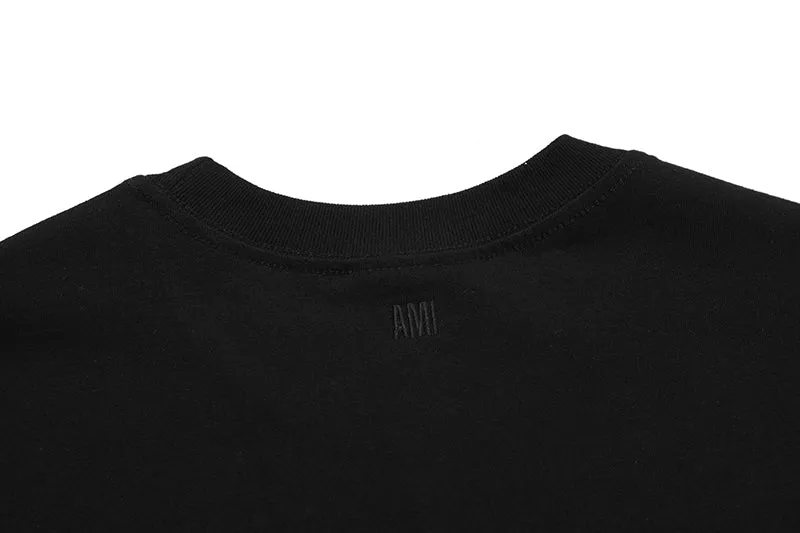 AMI PARIS - BLACK TEE WITH BIG RED HEART LOGO EMBROIDERED