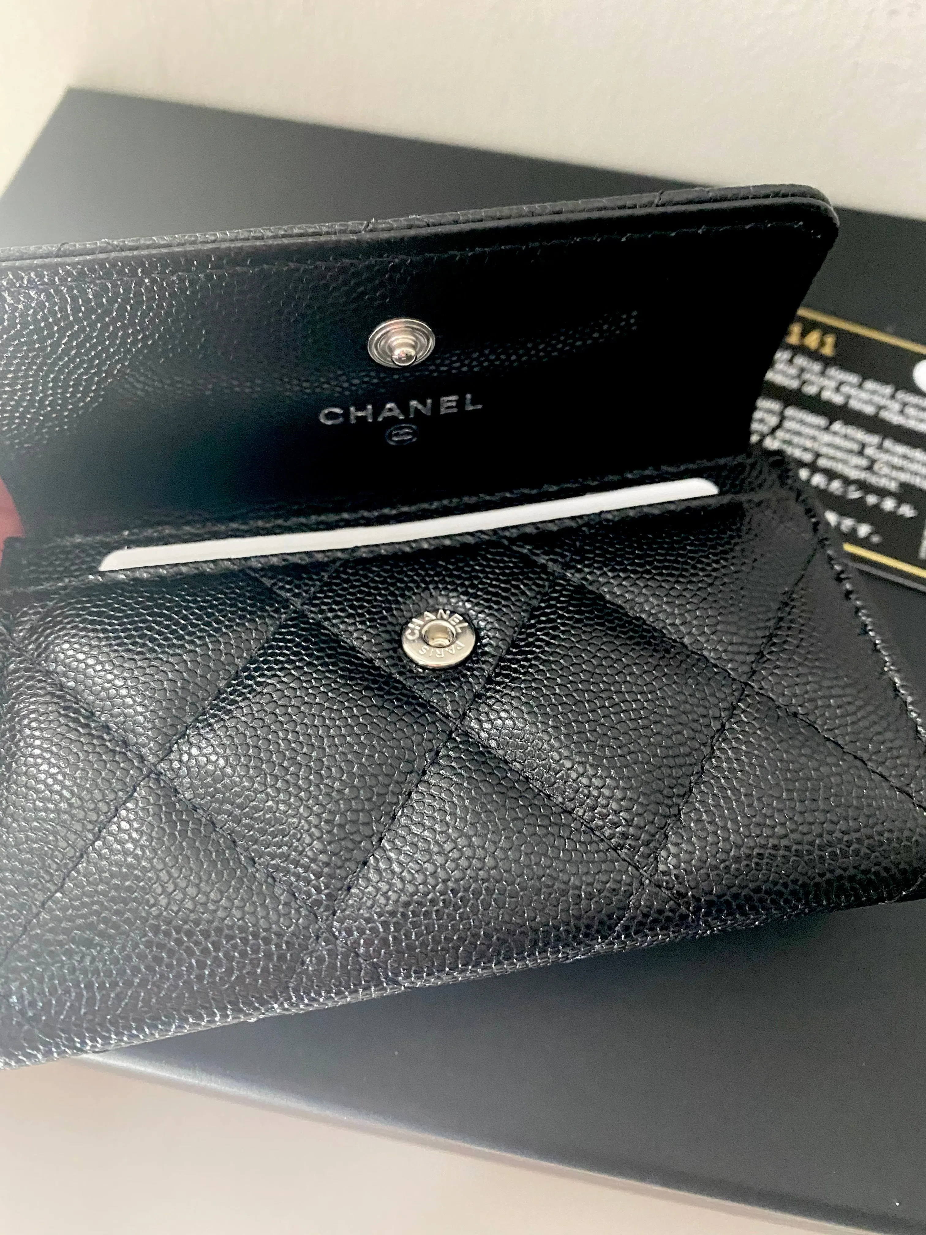 Chanel flap card holder.