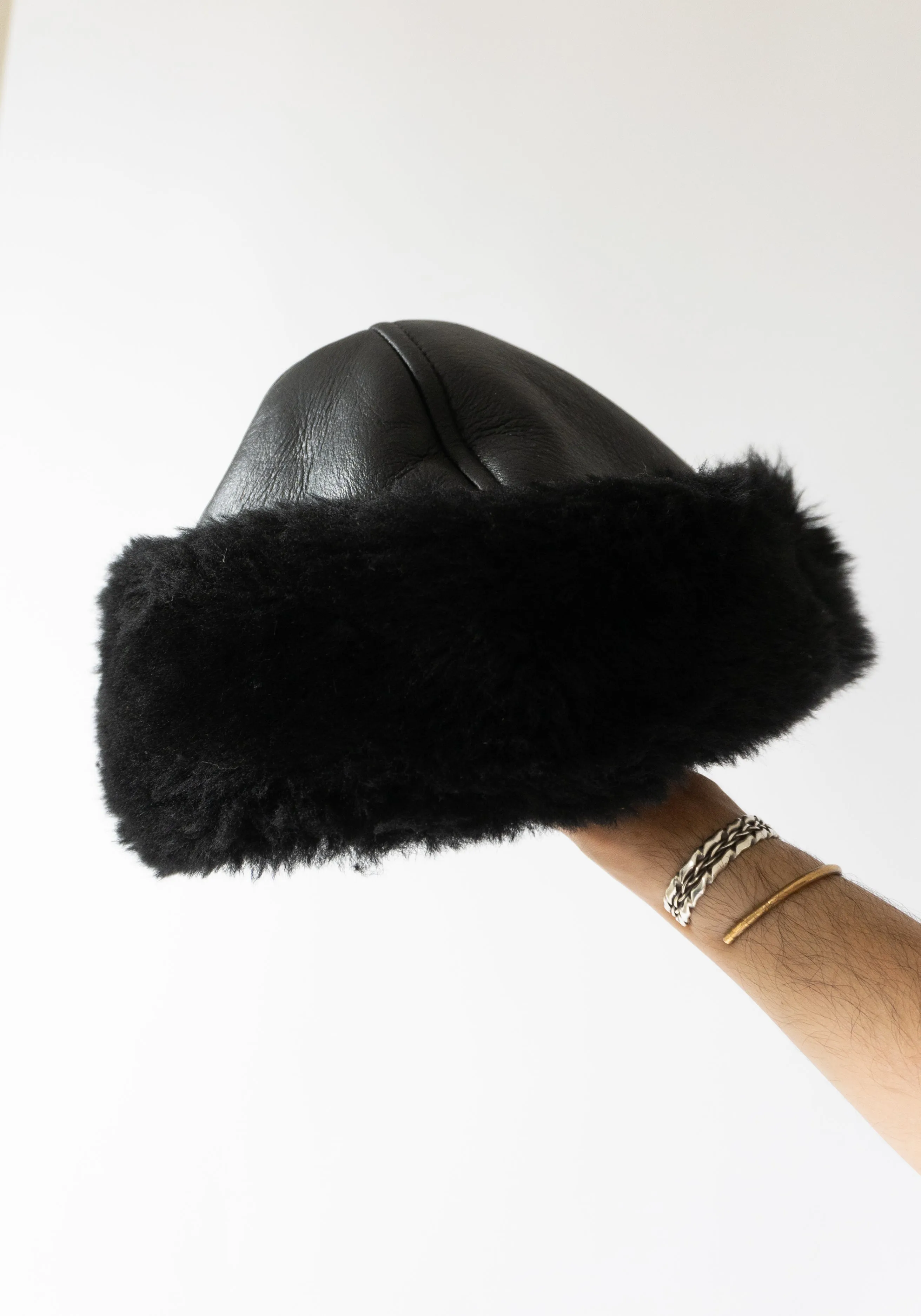 Leather and Shearling Cap in Black