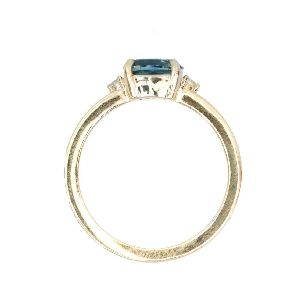 Teal Blue Three Stone Ring featuring 1.15ct cushion sapphire and diamonds in East-West setting